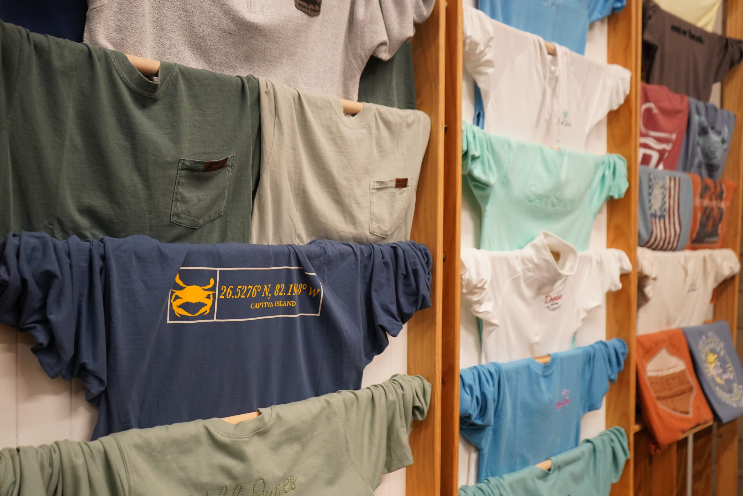 A row of custom-made t-shirts